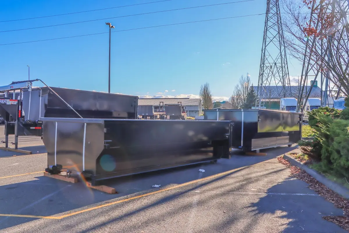 Roll-off dumpster ready for waste disposal at job site for 2 Yard Dumpster Rental in Memphis